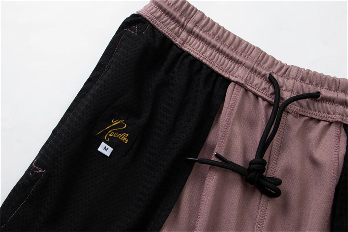 Розови широки панталони с игли за мъже и жени, високо качество на найлонови панталони с логото и бродерия на пеперуда 1: 1