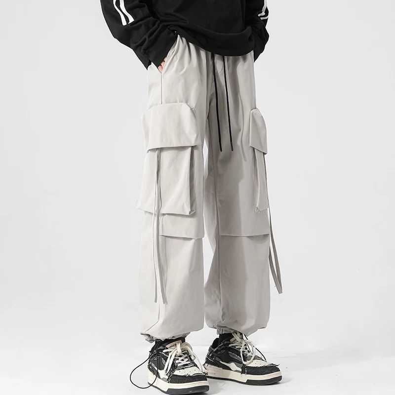 Японски модни Мъжки широки панталони за къмпинг във военната стил, всекидневни, с големи джобове, Дизайнерски спортни панталони за бягане, Мъжки панталони-Карго, Широки панталони 5XL